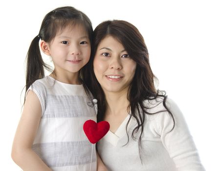Photo of Asian mother and daughter on white background