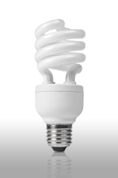 Energy saving fluorescent light bulb on white bakground 