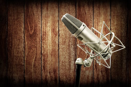Microphone in studio with wooden wall, Music studio concept
