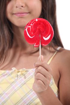 Girl holding a lolly pop