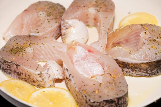 The fried fish on the frying pan