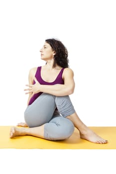 An image of a pretty woman doing yoga