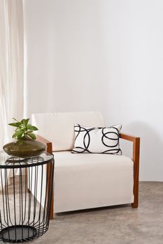 Bright white armchair in a living room