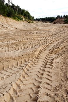 Freight car wheel marks left in the sand pit.