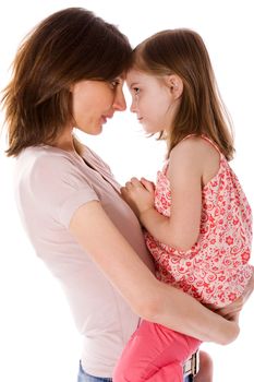 Mother with daughter sharing secrets isolated on white