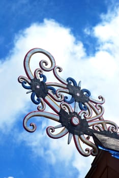 borneo traditional tribal carvings on the roof top of buildings