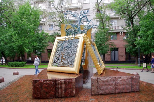 Moscow, Russia - June 14, 2010: Summer day. Peoples walk near the fountain of arts on June 14, 2010 in Lavrushinsky sidesteet, Moscow, Russia