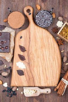 Kitchen board with prepared ingredients for baking