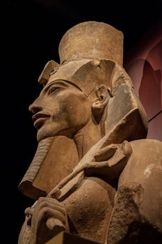 Side view of real statue of pharaoh