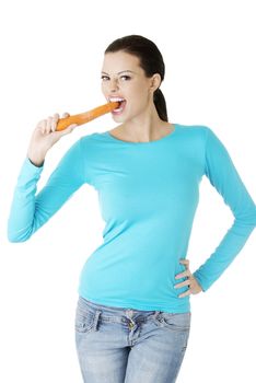 Fit young happy beautiful woman with carrot, isolated on white