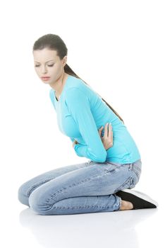 Young woman with stomach issues,isolated on white