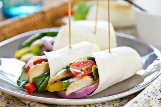 Grilled chicken with fresh vegetables tortilla by sour cream dressing