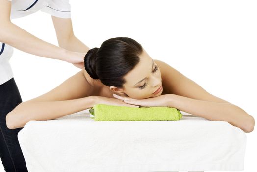 Preaty young woman relaxing heaving massage therapy in spa saloon