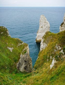 France, Normandy, sea and rock formation in Etretat. Vertical view