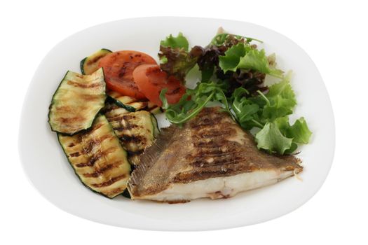 fried fish with vegetables and salad