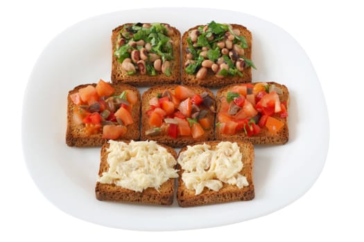 toasts with beans, fish and tomato