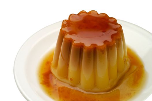 Creme caramel in a dish closeup with clipping path