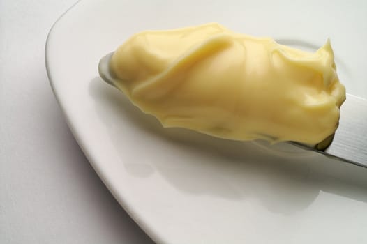 Mayonnaise, butter or margarine  on a knife tip (3)
