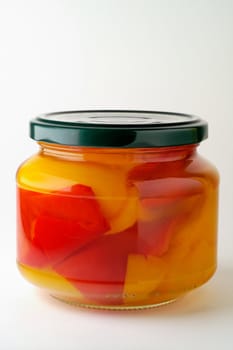 Glass jar of preserved peppers 