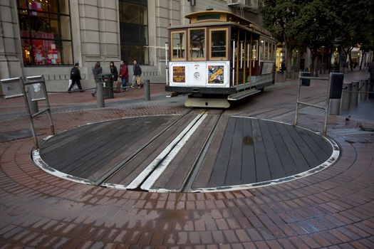 San Francisco cable car entering Powell Street terminal turntable, early morning