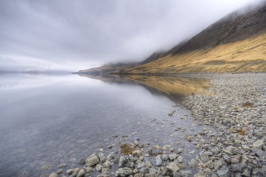 fjord in iceland, stormy wather, wide angle