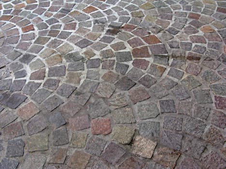 A path of bricks that creates a pattern.
