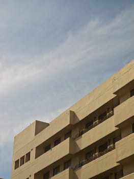 Facade windows of office building on blue sky