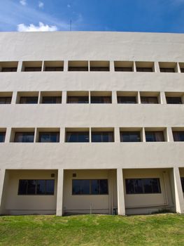 Facade windows of office building on blue sky