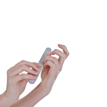 Woman polishing fingernails using the nail file, isolated over white - square 
