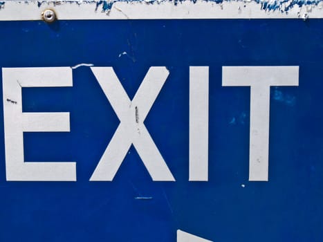 Blue exit road sign