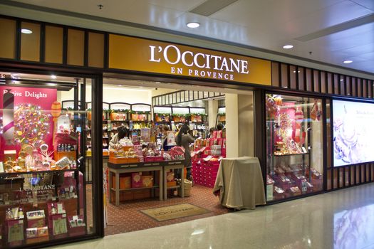 HONG KONG - DEC 22,  L'Occitane opens a shop in Tuen Mun, Hong Kong on 22 Decemeber, 2011. There are many people shopping there.