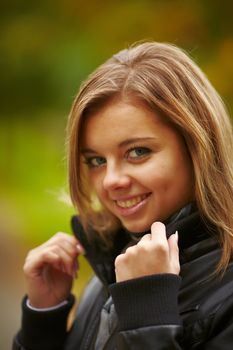 Beautiful girl on a background autumn nature