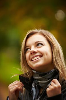 Beautiful girl on a background autumn nature