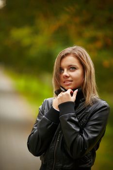 Beautiful girl on a background autumn nature