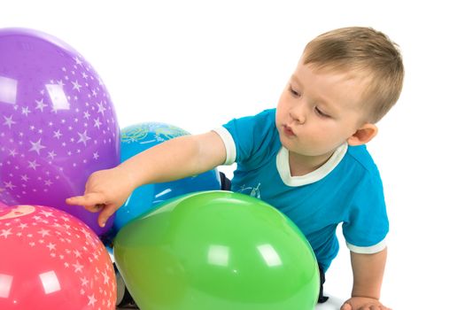 The boy counts balloons, a white background