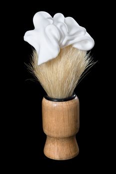 Brush for shaving - it is isolated on a black background
