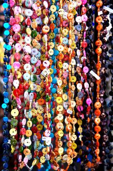 Many necklaces, with different forms and colors