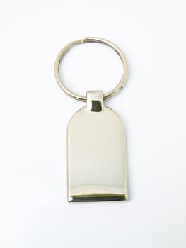 A metalic trinket keychain isolated on white background