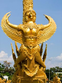 Golden wax sculpture at Tung Sri Muang park in Ubon Ratchathani province, Thailand