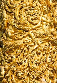 Golden wax sculpture at Tung Sri Muang park in Ubon Ratchathani province, Thailand