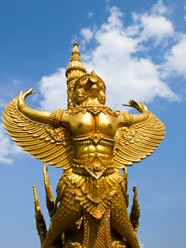 Golden wax sculpture at Tung Sri Muang park in Ubon Ratchathani province, Thailand