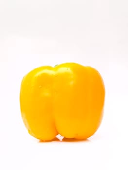 Fresh yellow bell pepper, Capsicum annuum, isolated on white background