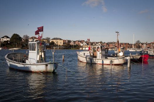 Flooding in the fishing harbor of Nyborg, Denmark after more days of heavy storm.