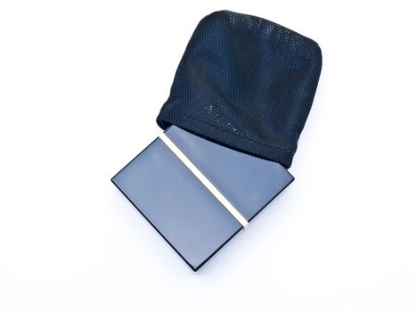 Face powder in a black box and pouch isolated in a white background