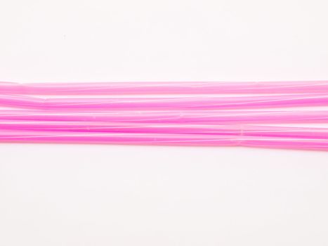 Pink straws isolated on white background