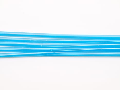 Light blue straws isolated on white back ground