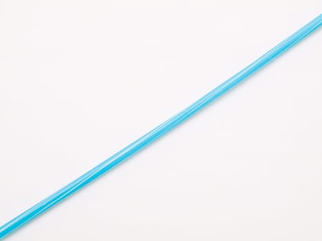 Light blue straw isolated on white back ground