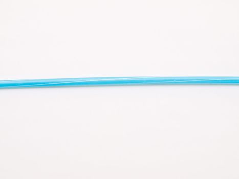 Light blue straw isolated on white back ground