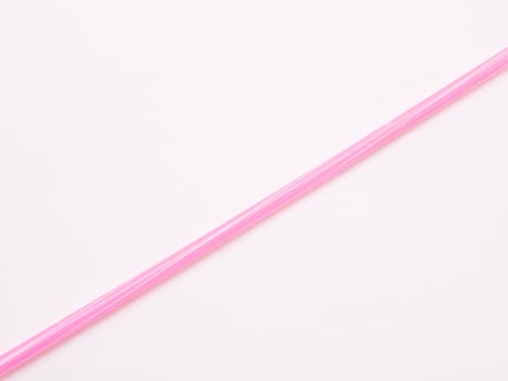 Pink straw isolated on white background