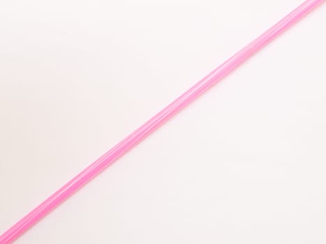 Pink straw isolated on white background